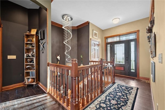 10366 Immel St NE, Canton, OH 44721 - entrance foyer with baseboards, a chandelier, and wood finished floors