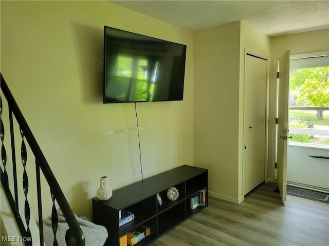 827 Randall Dr, Kent, OH 44240 - foyer entrance featuring wood finished floors, stairway, and a textured ceiling