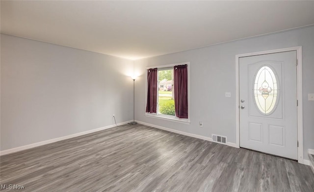 5963 Porter Rd, North Olmsted, OH 44070 - entrance foyer with wood finished floors and baseboards