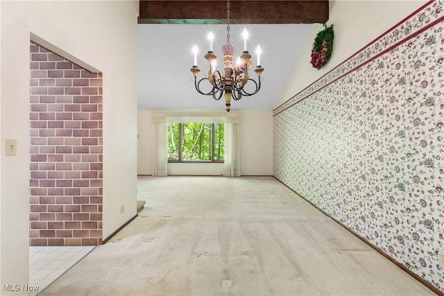 4512 Conestoga Trl, Copley, OH 44321 - unfurnished dining area with wallpapered walls, carpet flooring, a chandelier, and high vaulted ceiling