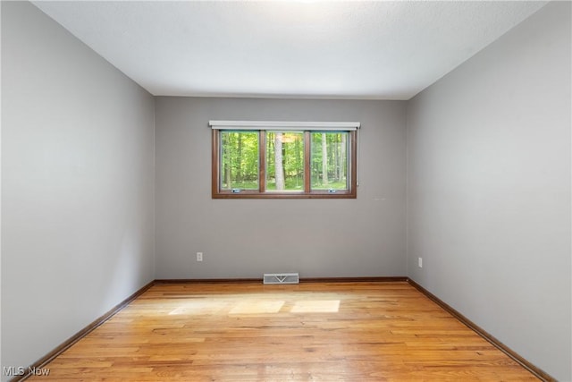 4512 Conestoga Trl, Copley, OH 44321 - spare room with light wood finished floors and baseboards