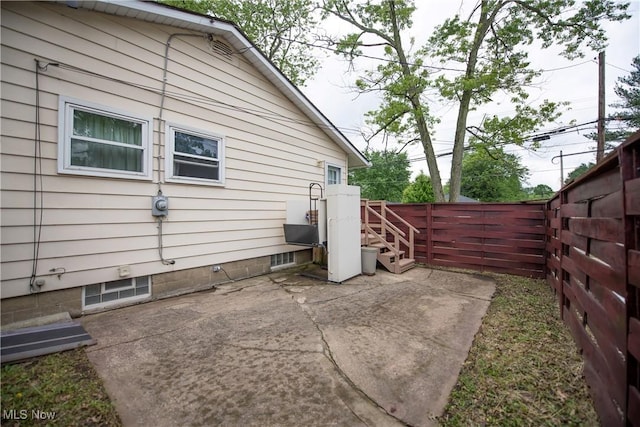 142 Marion Ave, Mogadore, OH 44260 - view of property exterior featuring a fenced backyard and a patio