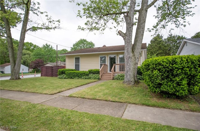 142 Marion Ave, Mogadore, OH 44260 - view of front of property with a front yard