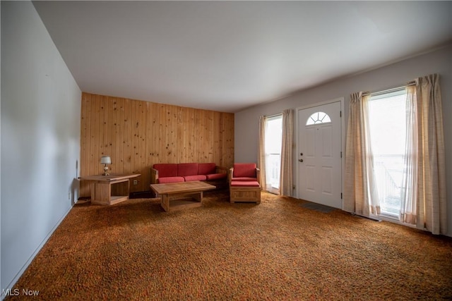 142 Marion Ave, Mogadore, OH 44260 - carpeted living area with wood walls