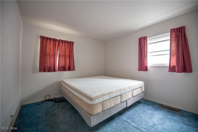 142 Marion Ave, Mogadore, OH 44260 - carpeted bedroom with baseboards