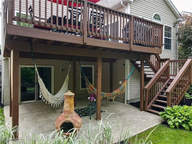 218 Treetop Spur, Copley, OH 44321 - back of property with a patio, a deck, and stairs