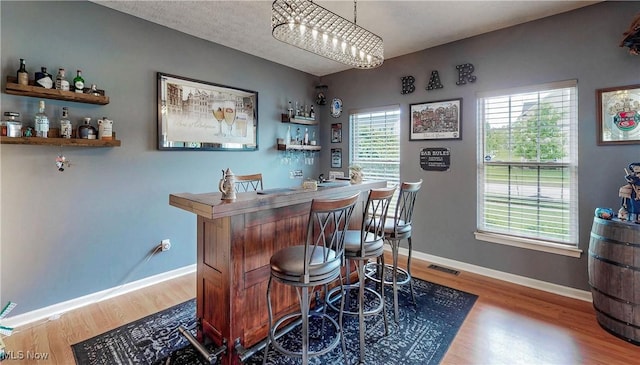 218 Treetop Spur, Copley, OH 44321 - indoor dry bar with wood finished floors and baseboards