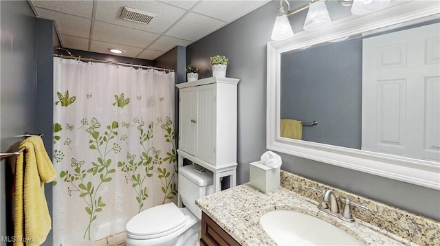 218 Treetop Spur, Copley, OH 44321 - bathroom with vanity, toilet, a paneled ceiling, and a shower with shower curtain