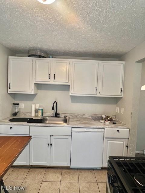 23855 Banbury Cir, Warrensville Heights, OH 44128 - kitchen featuring dishwasher, white cabinets, black range with gas stovetop, a textured ceiling, and light tile patterned floors