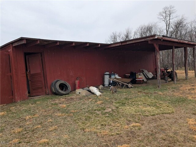 50364 Carroll Rd, East Liverpool, OH 43920 - view of pole building featuring a yard and a carport