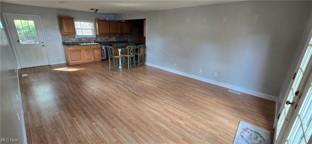 4604 7th Ave, Vienna, WV 26105 - kitchen with dishwasher, wood finished floors, and baseboards