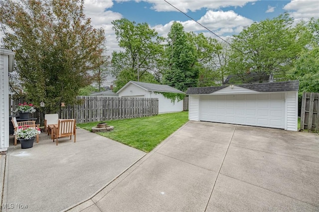 4206 Bushnell Rd, University Heights, OH 44118 - view of yard featuring an outbuilding and a detached garage