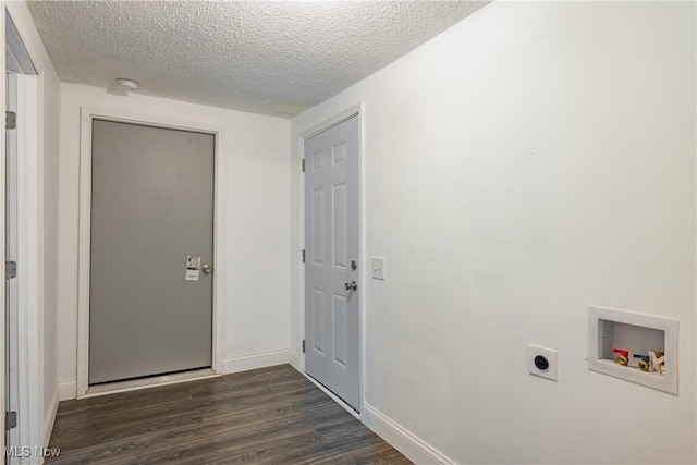 2403 45th St, Parkersburg, WV 26104 - washroom featuring electric dryer hookup, washer hookup, a textured ceiling, dark wood finished floors, and baseboards