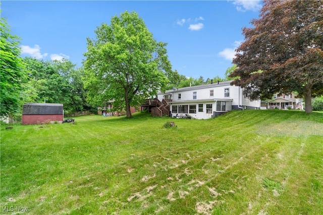 425 Warwick St, Akron, OH 44305 - view of grassy yard featuring a wooden deck
