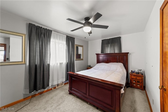 425 Warwick St, Akron, OH 44305 - bedroom with light colored carpet, multiple windows, ceiling fan, and baseboards