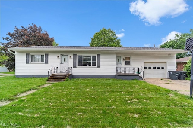 425 Warwick St, Akron, OH 44305 - single story home with a garage, a front lawn, and concrete driveway