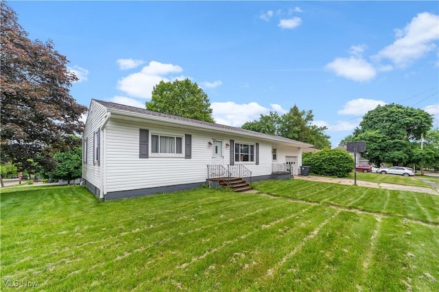 425 Warwick St, Akron, OH 44305 - view of front of home featuring a front yard and a garage
