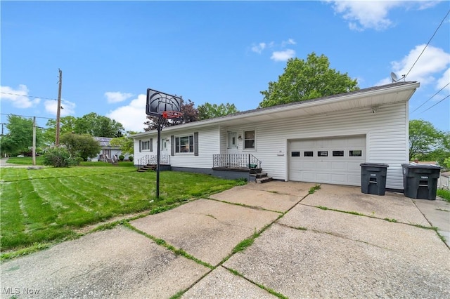 425 Warwick St, Akron, OH 44305 - ranch-style home featuring a garage, driveway, and a front lawn