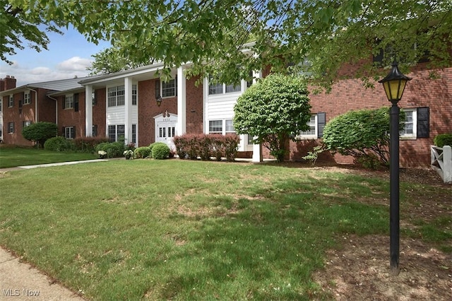 2932 Pease Dr Unit 210, Rocky River, OH 44116 - neoclassical / greek revival house featuring brick siding and a front lawn