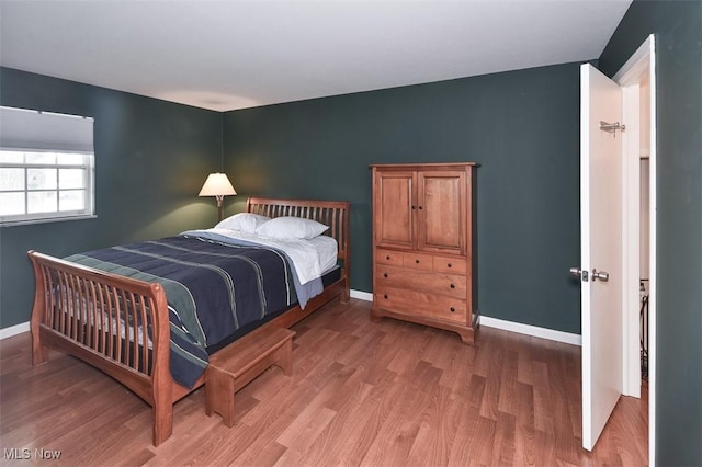 2932 Pease Dr Unit 210, Rocky River, OH 44116 - bedroom with light wood-type flooring and baseboards
