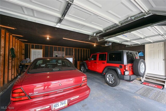 123 Wabash Ave, Orrville, OH 44667 - garage featuring a garage door opener