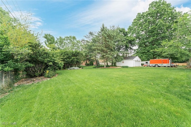 20110 Carolyn Ave, Rocky River, OH 44116 - view of grassy yard featuring a garage