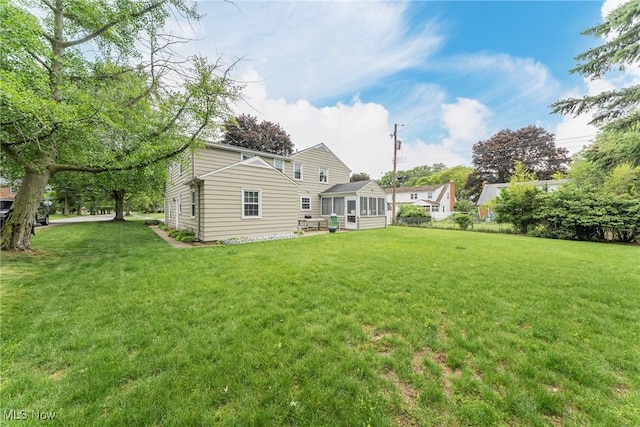 20110 Carolyn Ave, Rocky River, OH 44116 - back of property with a sunroom and a yard