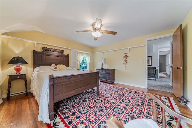 20110 Carolyn Ave, Rocky River, OH 44116 - bedroom featuring wood-type flooring, ceiling fan, and baseboards