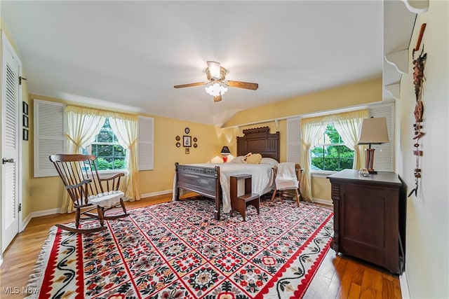 20110 Carolyn Ave, Rocky River, OH 44116 - bedroom featuring multiple windows, light wood finished floors, and baseboards