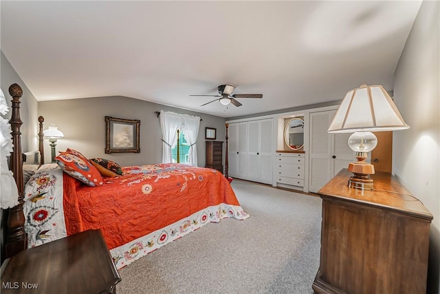 20110 Carolyn Ave, Rocky River, OH 44116 - bedroom featuring two closets, vaulted ceiling, and ceiling fan