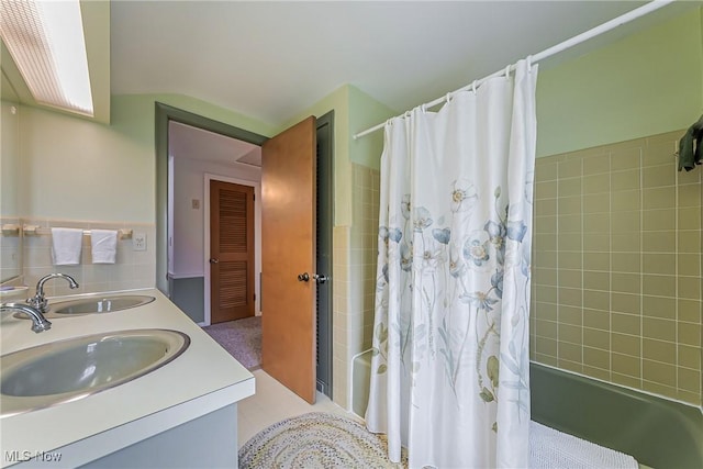 20110 Carolyn Ave, Rocky River, OH 44116 - full bath with double vanity, shower / bath combination with curtain, and tile walls