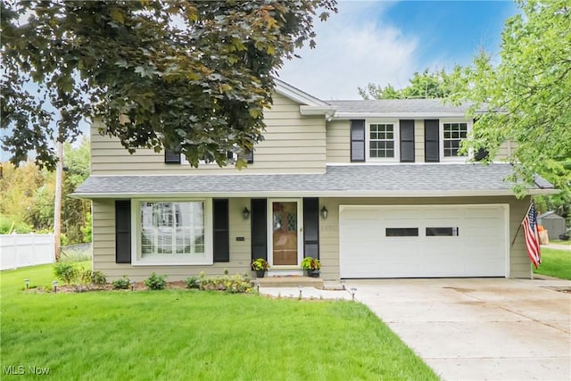 20110 Carolyn Ave, Rocky River, OH 44116 - traditional-style home with an attached garage, driveway, and roof with shingles