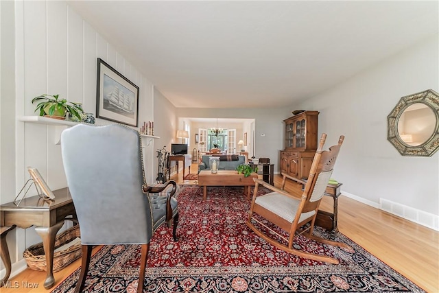 20110 Carolyn Ave, Rocky River, OH 44116 - living room with wood finished floors and a chandelier