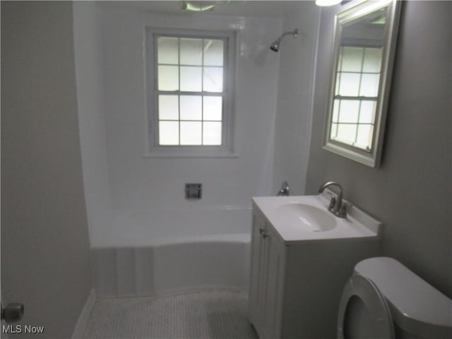 6453 Poplar Dr, Independence, OH 44131 - bathroom featuring toilet,  shower combination, and vanity