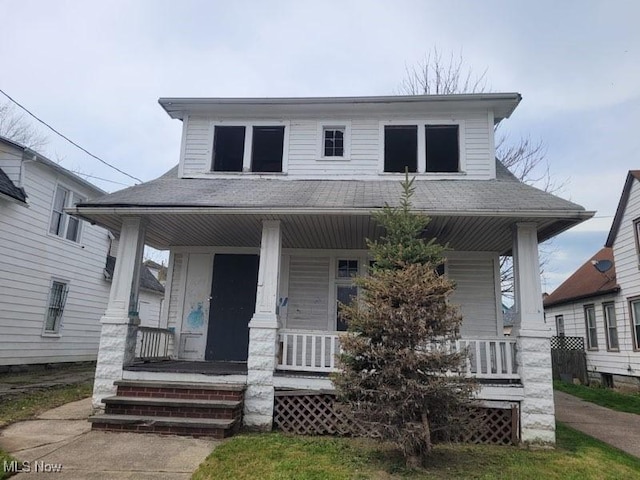 3474 W 60th St, Cleveland, OH 44102 - view of front of home with a porch and a shingled roof