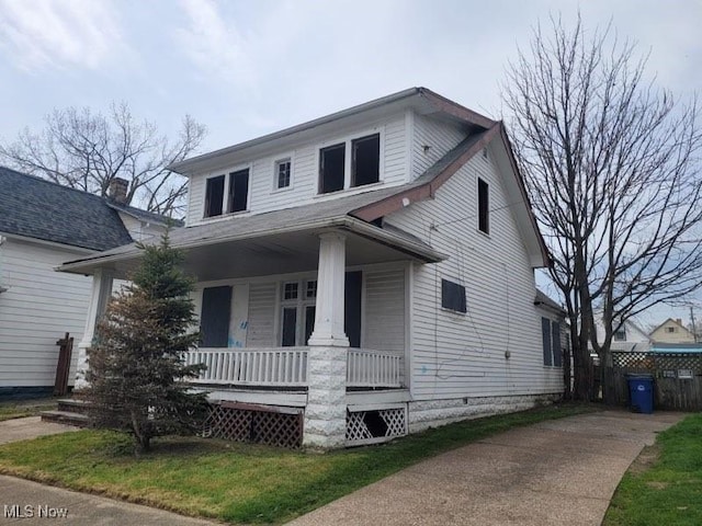 3474 W 60th St, Cleveland, OH 44102 - view of front facade with a porch and concrete driveway