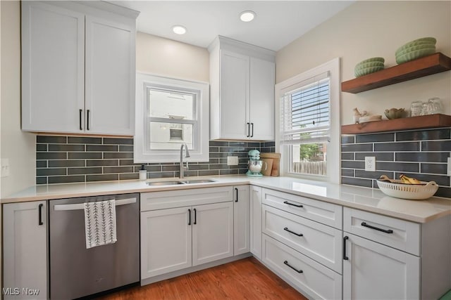 70 Samaritan Ave, Ashland, OH 44805 - kitchen with dishwasher, a sink, tasteful backsplash, light countertops, and recessed lighting