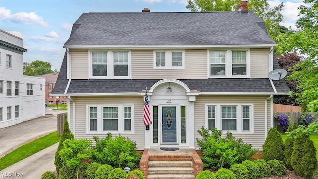 70 Samaritan Ave, Ashland, OH 44805 - dutch colonial featuring a chimney and roof with shingles