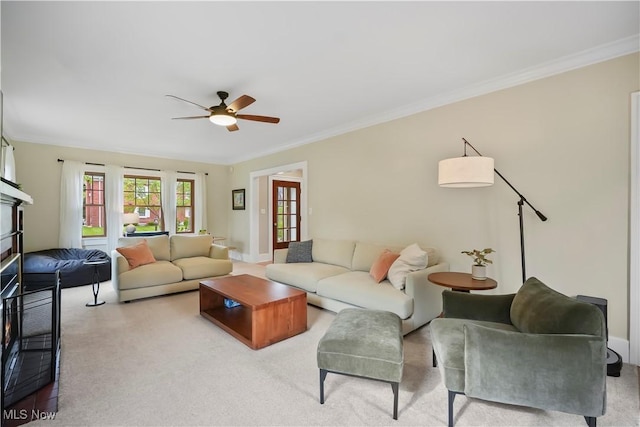 70 Samaritan Ave, Ashland, OH 44805 - carpeted living room with a ceiling fan and ornamental molding