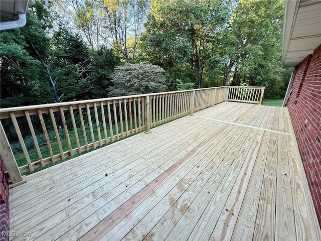 305 Flintwood Dr, Marietta, OH 45750 - wooden deck featuring view of wooded area