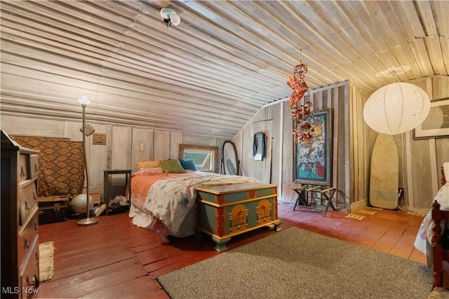 15216 Grove Rd SE, Port Washington, OH 43837 - bedroom with lofted ceiling, hardwood / wood-style floors, and wood walls