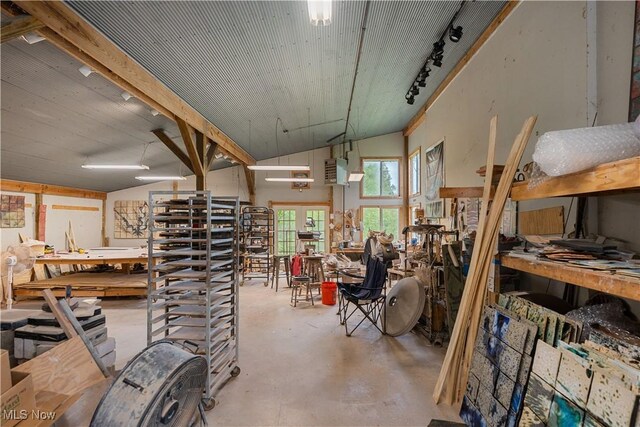 15216 Grove Rd SE, Port Washington, OH 43837 - miscellaneous room with a workshop area, finished concrete floors, lofted ceiling, and rail lighting