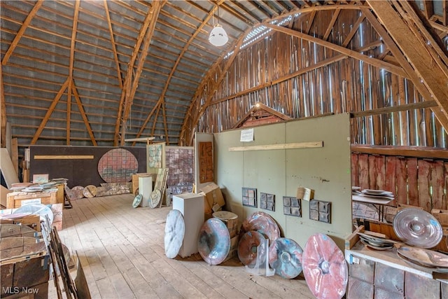 15216 Grove Rd SE, Port Washington, OH 43837 - miscellaneous room with hardwood / wood-style floors and high vaulted ceiling