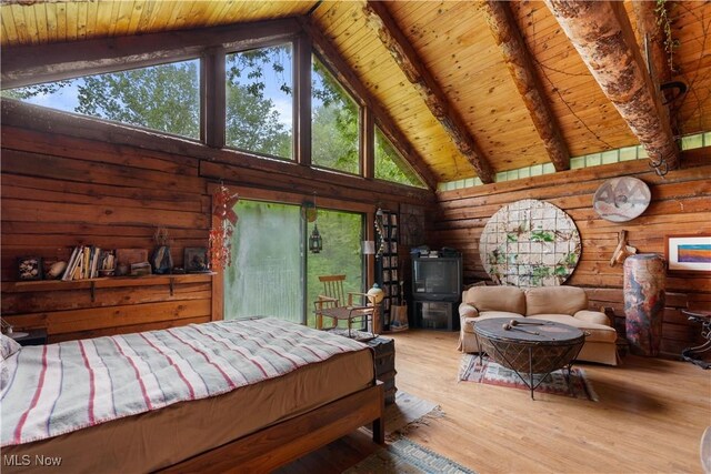 15216 Grove Rd SE, Port Washington, OH 43837 - bedroom featuring wooden ceiling with exposed beams, high vaulted ceiling, wood finished floors, and wooden walls