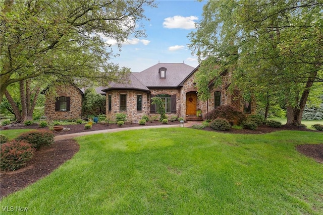 3109 Kennesaw Cir NW, Canton, OH 44708 - view of front of home with stone siding and a front yard