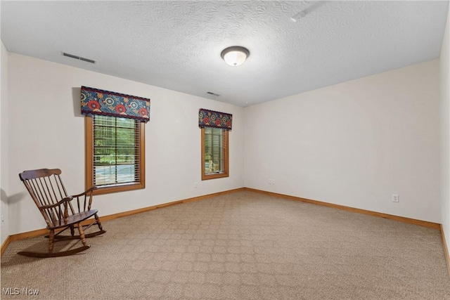 3109 Kennesaw Cir NW, Canton, OH 44708 - unfurnished room featuring carpet flooring, baseboards, and a textured ceiling