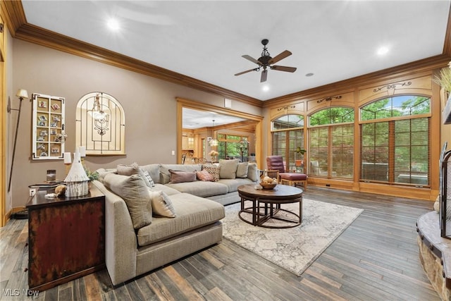 3109 Kennesaw Cir NW, Canton, OH 44708 - living room with ornamental molding, a ceiling fan, wood finished floors, and recessed lighting