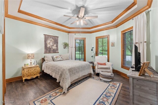 3109 Kennesaw Cir NW, Canton, OH 44708 - bedroom with a raised ceiling, ornamental molding, wood finished floors, baseboards, and ceiling fan