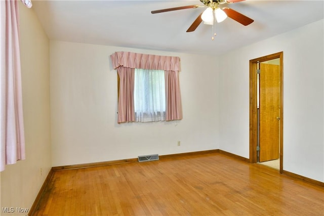 3763 E River Rd, Newton Falls, OH 44444 - unfurnished room with wood finished floors, baseboards, and a ceiling fan
