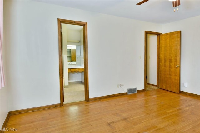 3763 E River Rd, Newton Falls, OH 44444 - spare room featuring light wood-style floors, a ceiling fan, and baseboards